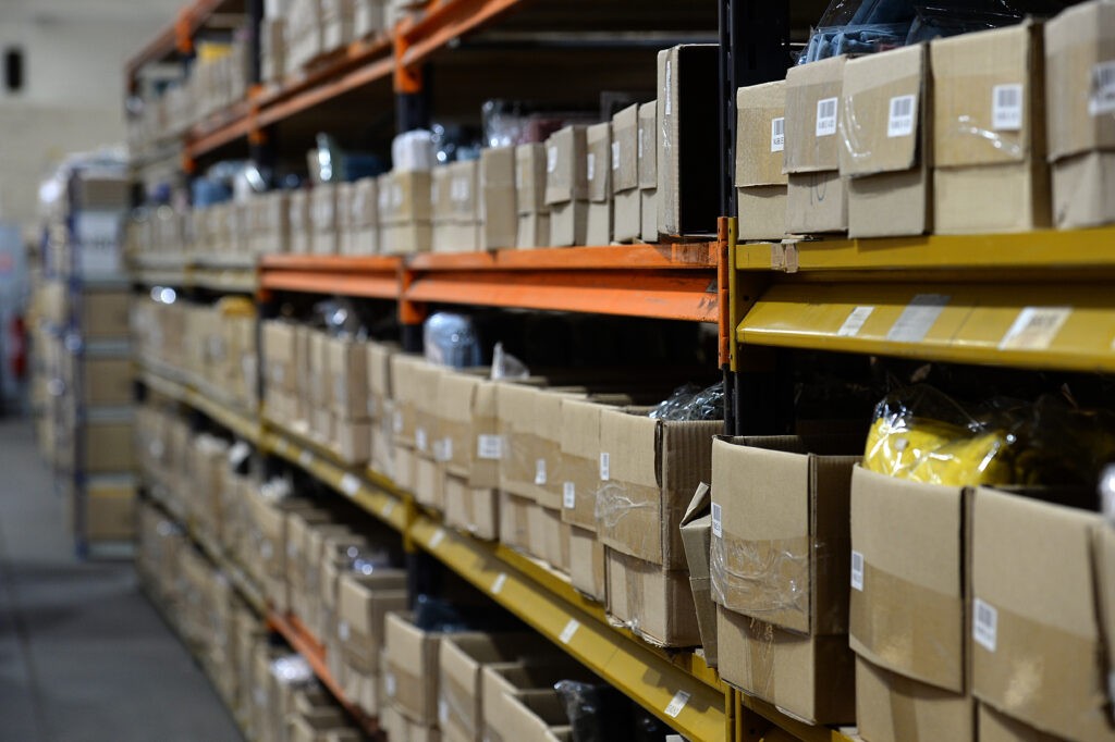 Cardboard boxes on shelves