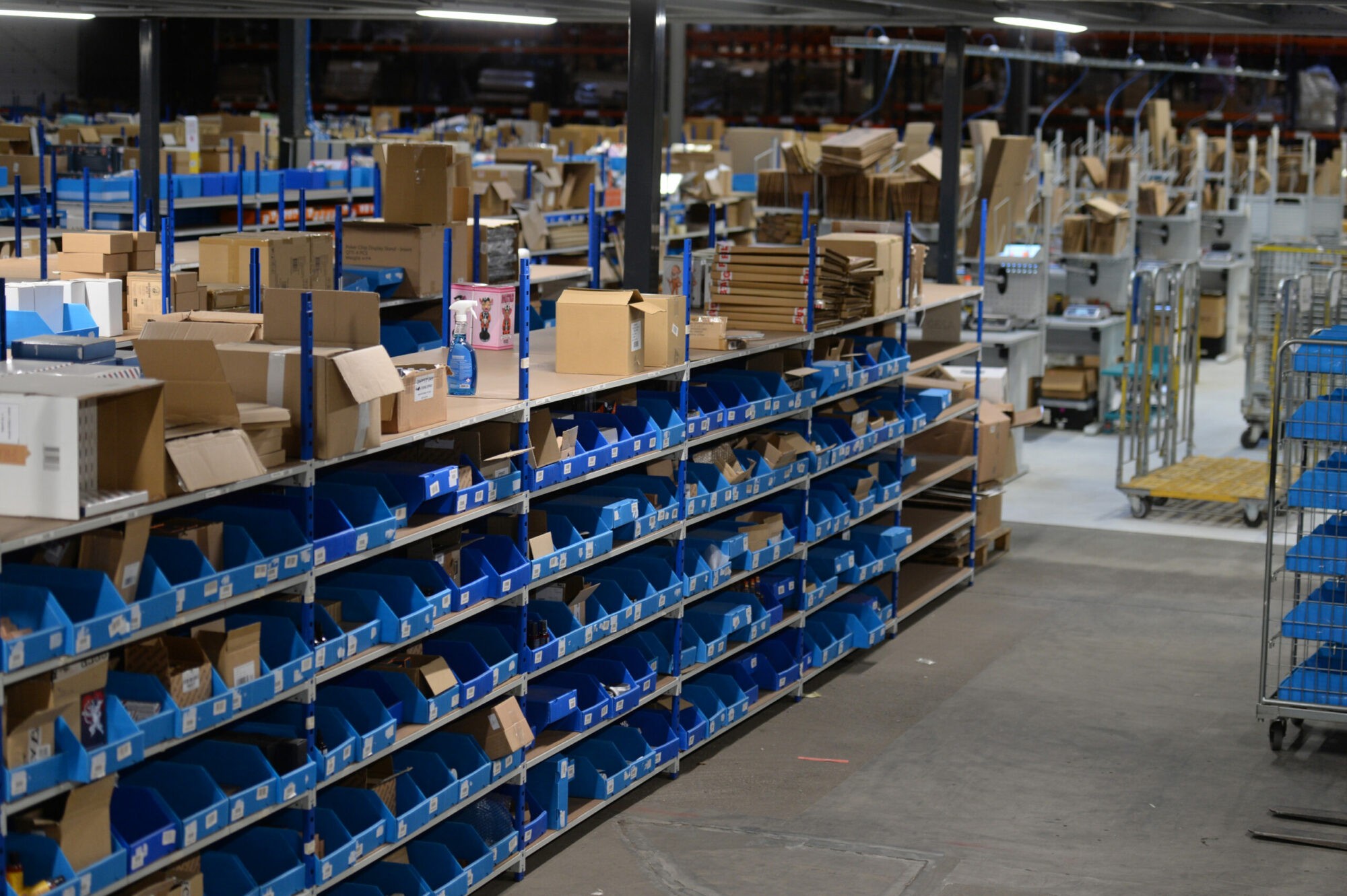 Packages stored on shelves in the preparation area